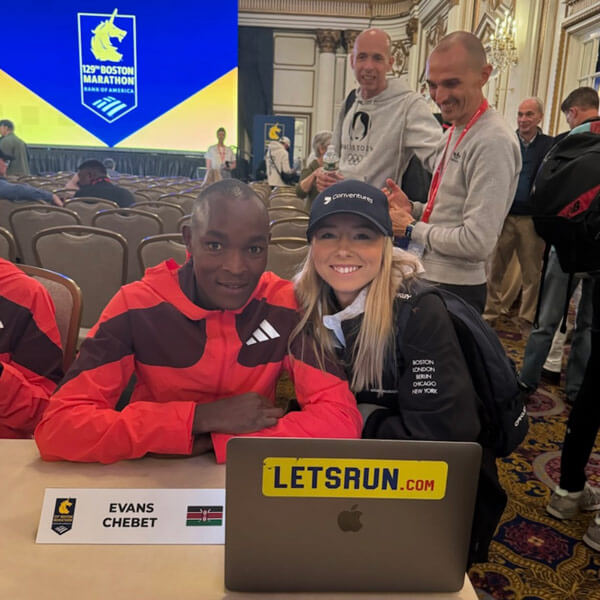 Caroline with 2022 and 2023 Boston Marathon winner Evans Chebet